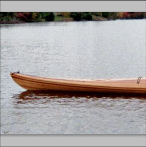 Cedar strip kayak on a lake
